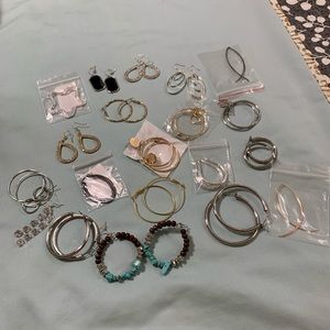 20 pairs of pierced earrings. Some brand new.